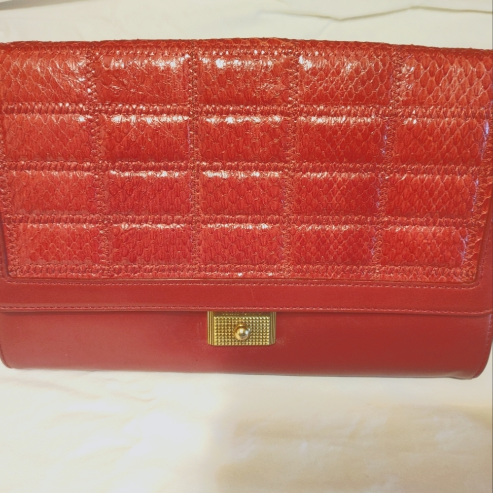 Red leather Jimmy Choo large clutch bag with gold hardware.